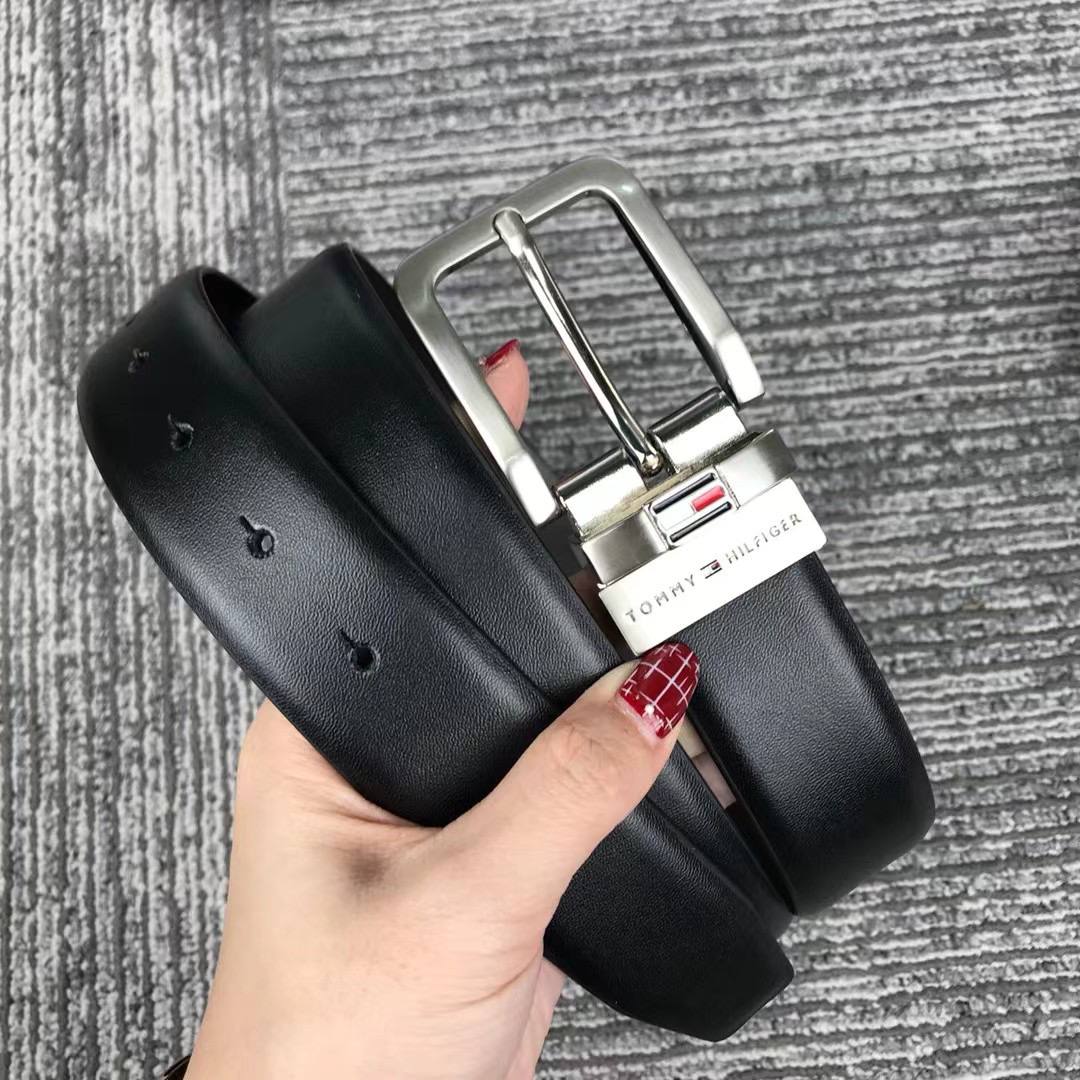 Tommy Hilfiger Black Leather Belt featuring Classic Silver Tone Prong Buckle