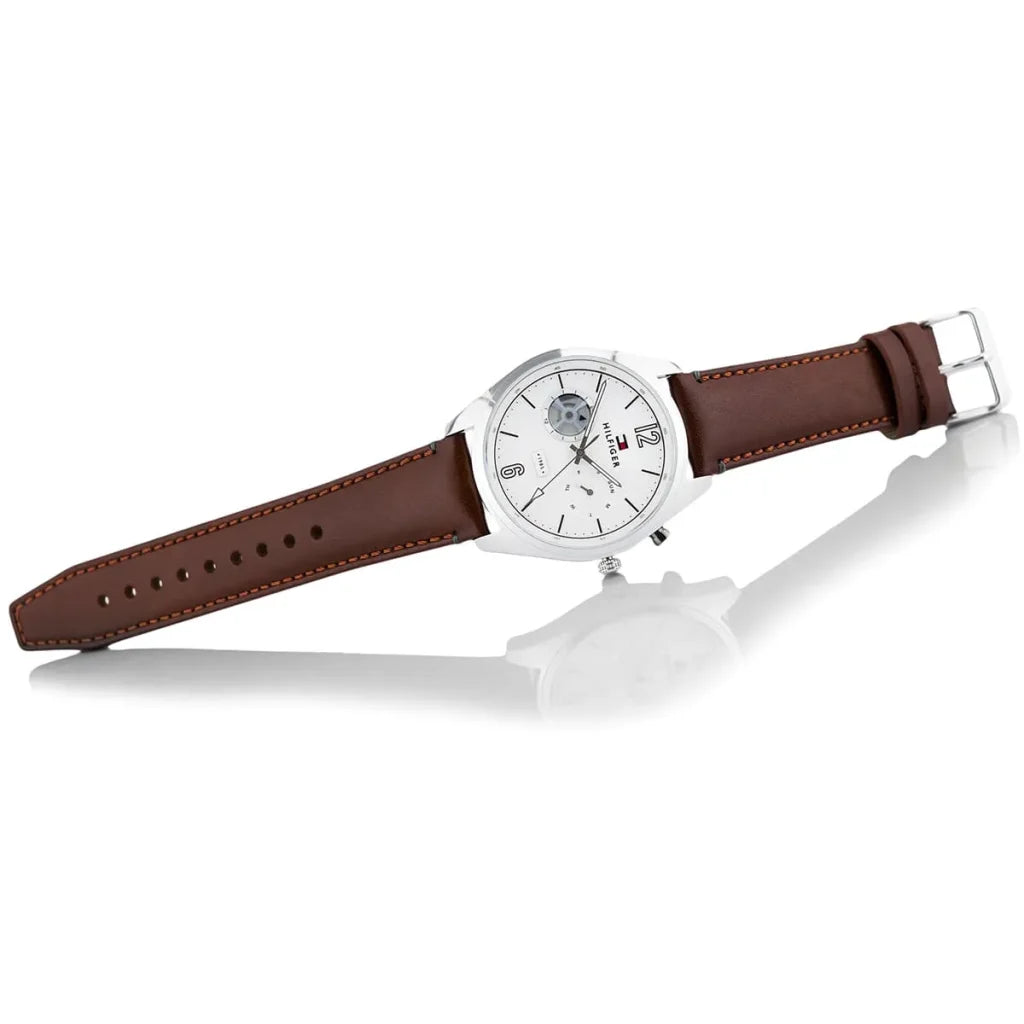 Perspective view of the silver sunray dial and numeric markers of Tommy Hilfiger watch