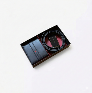 Black belt and wallet set in a box on a white background