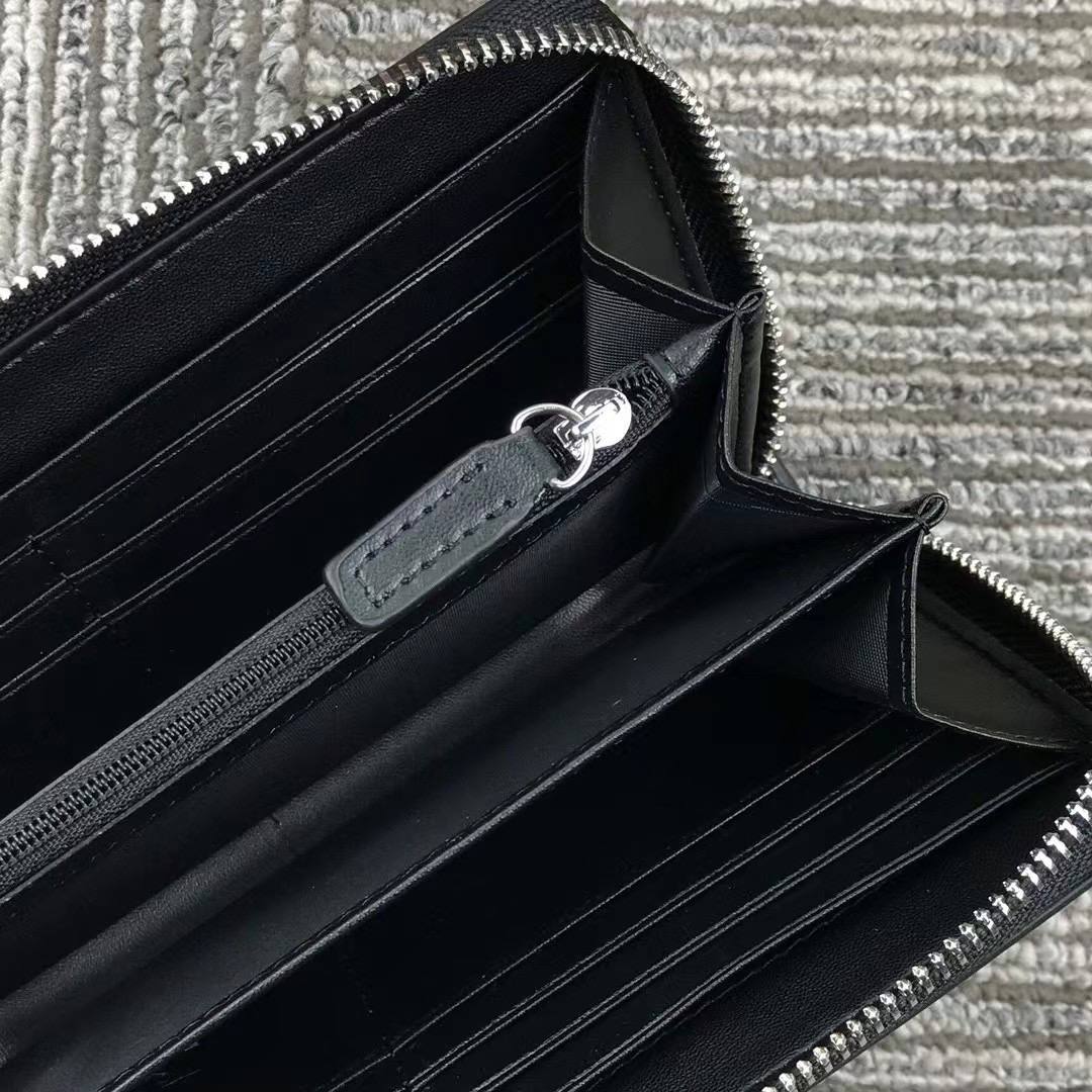 Tommy Hilfiger brand name embossed inside black leather long wallet