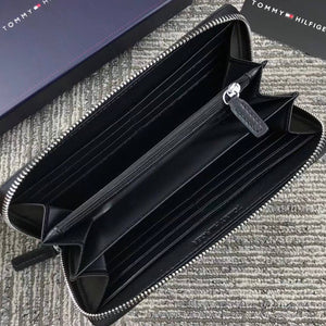 Interior view of Tommy Hilfiger Long Wallet showing multiple card slots and zipper coin pocket