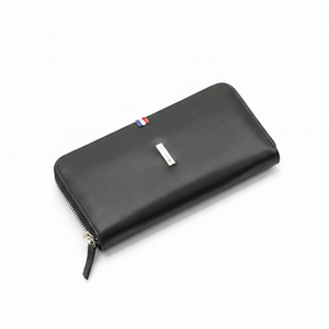 Front view of Tommy Hilfiger long zip-around wallet showing official logo details and zipper closure.