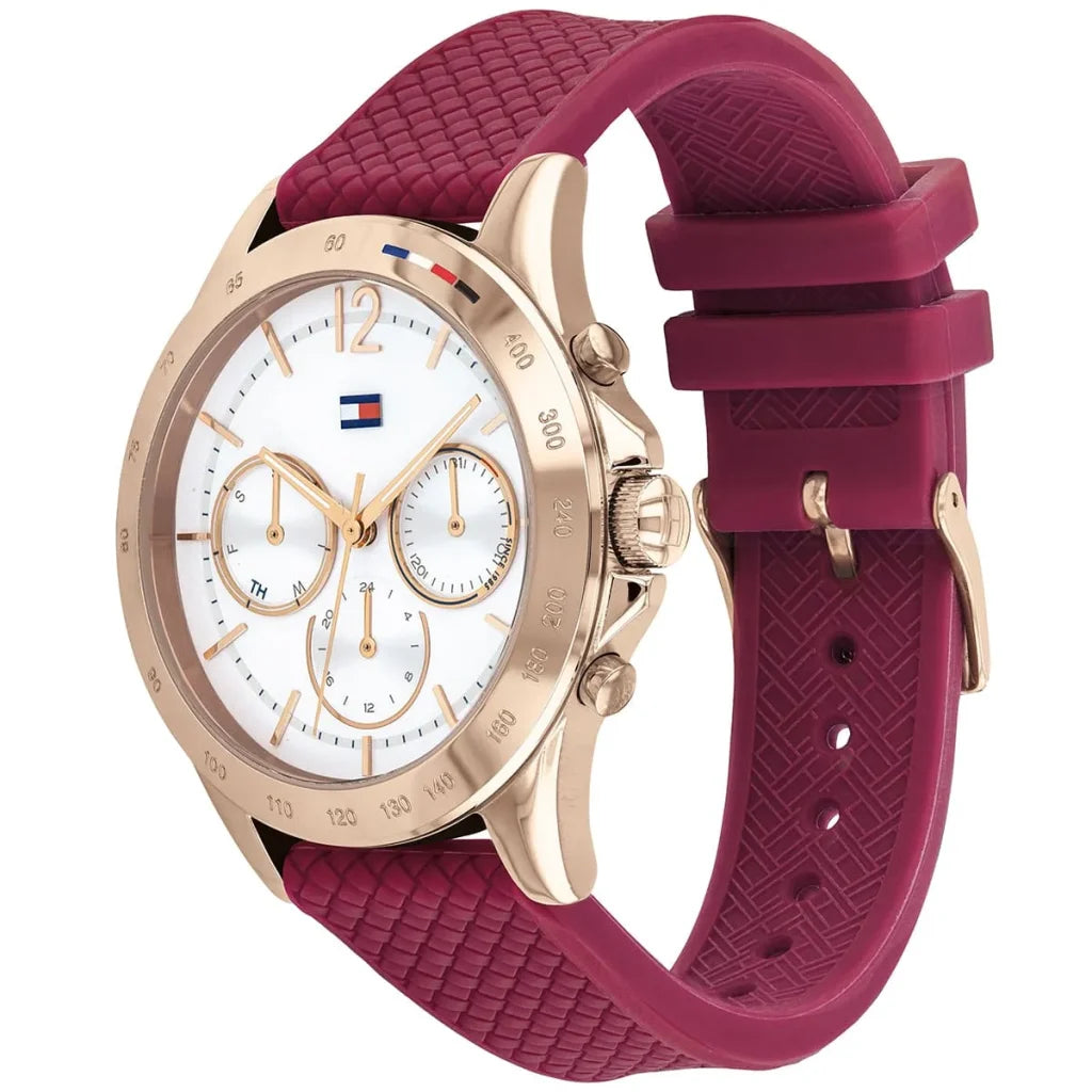 Profile view of Tommy Hilfiger Lori showing case thickness and berry rubber strap