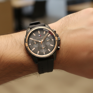 Close up of gray dial and rose gold-tone markers of Tommy Hilfiger 1791792