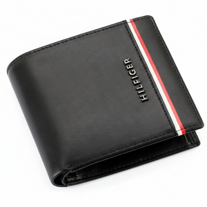 Interior view of a Tommy Hilfiger black leather wallet showing card slots, a coin compartment, and branded signature interior lining
