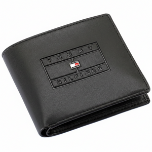 Front view of an authentic Tommy Hilfiger men's black genuine leather bifold wallet featuring a premium embossed flag box logo design and silver metal flag emblem