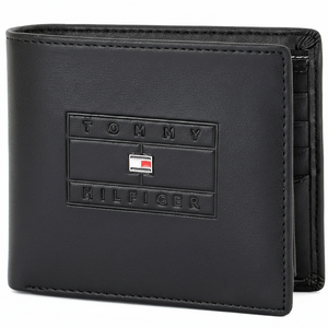 Front view of an authentic Tommy Hilfiger men's black genuine leather bifold wallet featuring a premium embossed flag box logo design and silver metal flag emblem