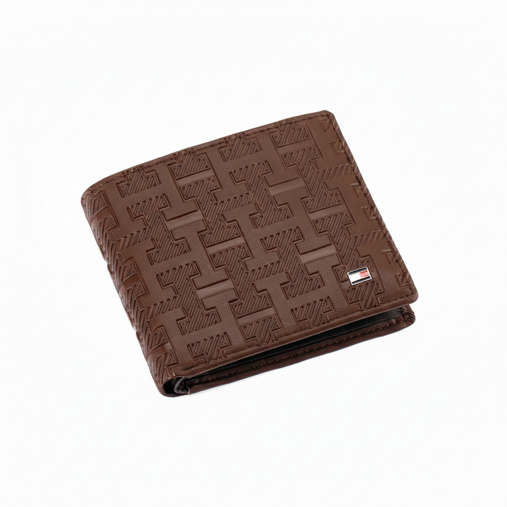 Front view of a Tommy Hilfiger men's brown leather wallet featuring an all-over embossed monogram pattern and the iconic small enamel flag logo