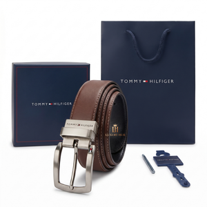 Tommy Hilfiger brown belt with silver buckle and packaging on a white background