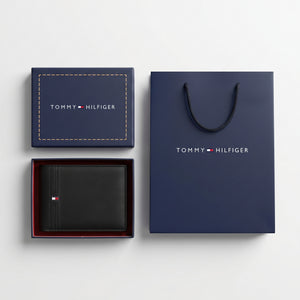 Full presentation of the Tommy Hilfiger mirror original smooth leather bi-fold wallet set with navy gift box and shopping bag