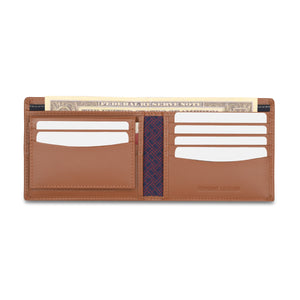 Lifestyle view of Tommy Hilfiger Wallet holding cash and cards