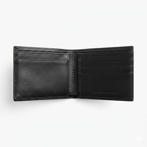 Internal layout view of the opened Tommy Hilfiger mirror original leather bifold wallet showcasing symmetrical card slots and debossed text branding