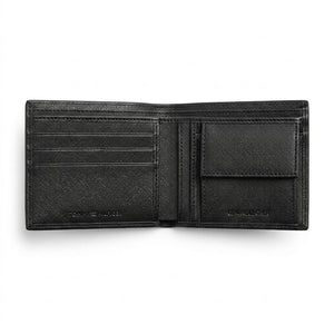 Live high-angle view of the Tommy Hilfiger smooth leather wallet currency compartment displaying the navy fabric lining and original tracking barcode label