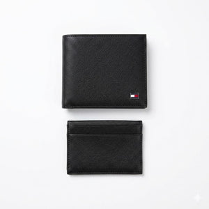 Live layout presentation of the Tommy Hilfiger smooth black leather bifold wallet showcasing clean premium stitching detail