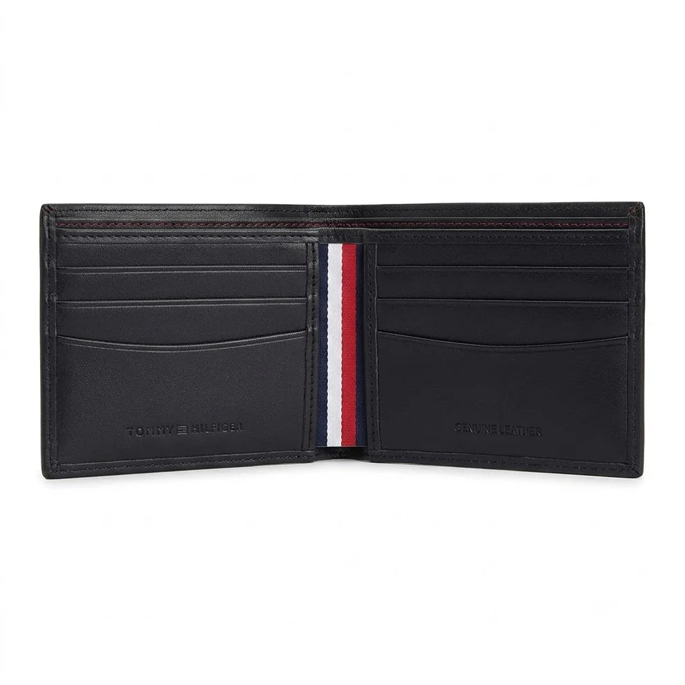 Live open layout view of the Tommy Hilfiger textured black leather bifold wallet interior showcasing symmetrical card slots and clean stitched edges