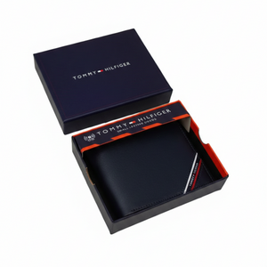 Tommy Hilfiger navy blue leather wallet with diagonal stripe corner presented inside open official gift box