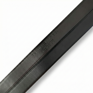 Close up of Engraved Tommy Hilfiger Logo on Genuine Leather Belt Strap