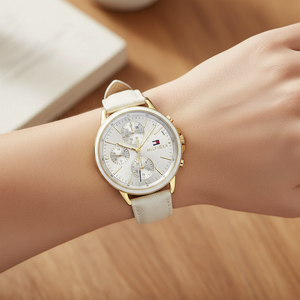 Close up of silver sunray dial and gold-tone sub-dials of Tommy Hilfiger 1781790