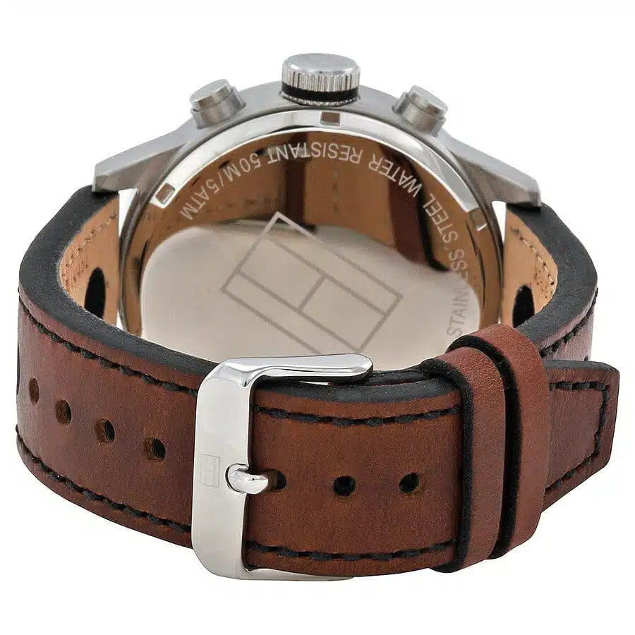 Angled shot highlighting the brown perforated leather strap on Tommy Hilfiger 1791049