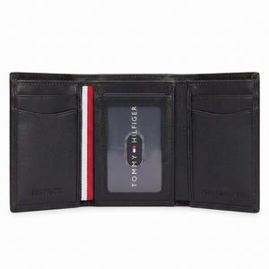 Internal layout view of the Tommy Hilfiger trifold wallet showcasing card slots, clear ID window, and signature color stripe