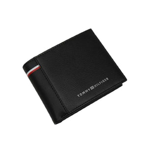 Close up angled view of Tommy Hilfiger wallet showing pebbled leather texture and branding detail