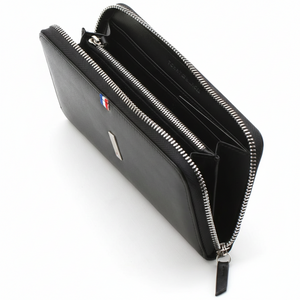 Side profile view of the Tommy Hilfiger long wallet showing sleek design and branded metal zipper puller.