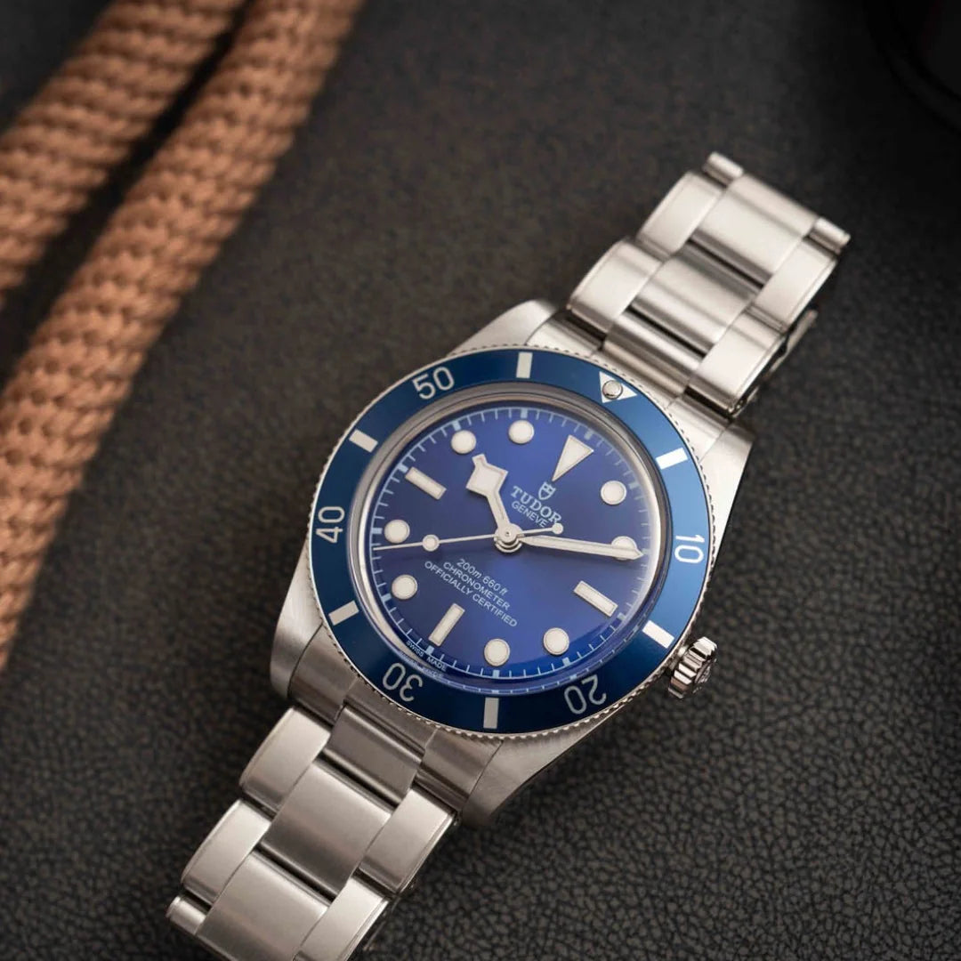 Tudor Black Bay 58 M79030B-0001 men's automatic dive watch, 39mm stainless steel case, navy blue dial, steel bracelet – lifestyle angle view