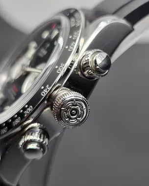 Tudor Black Bay Chrono men's chronograph watch, 41mm stainless steel case, black dial, black rubber strap – pushers close-up