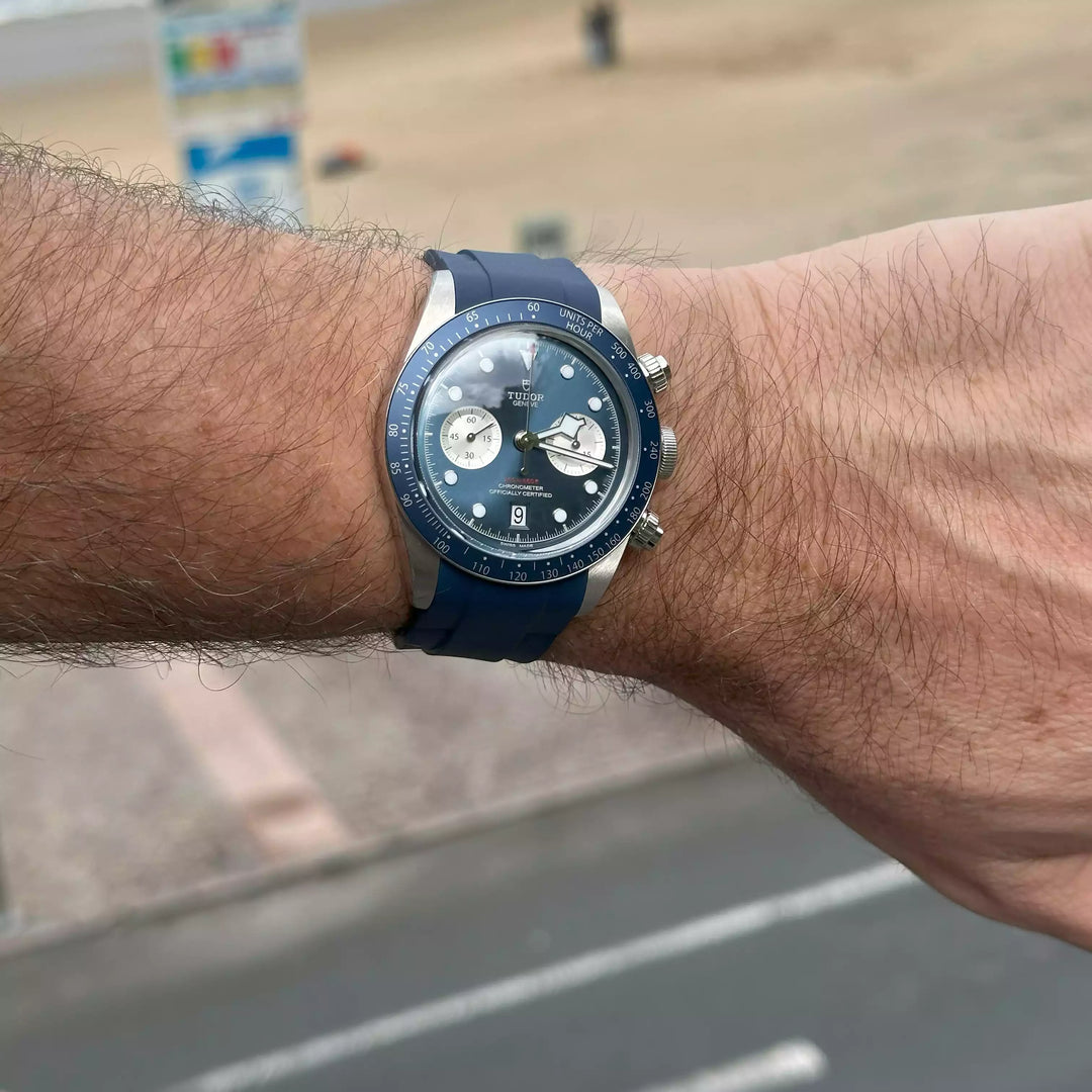Tudor Black Bay Chrono men's chronograph watch, 41mm stainless steel case, blue dial, blue rubber strap – lifestyle wrist view