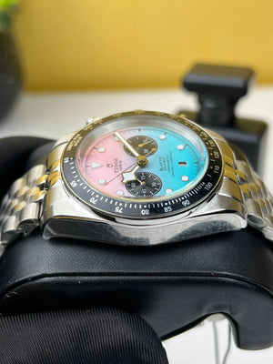 Tudor Black Bay Chrono men's chronograph watch, 41mm stainless steel case, pink and turquoise gradient dial, steel bracelet – angle view