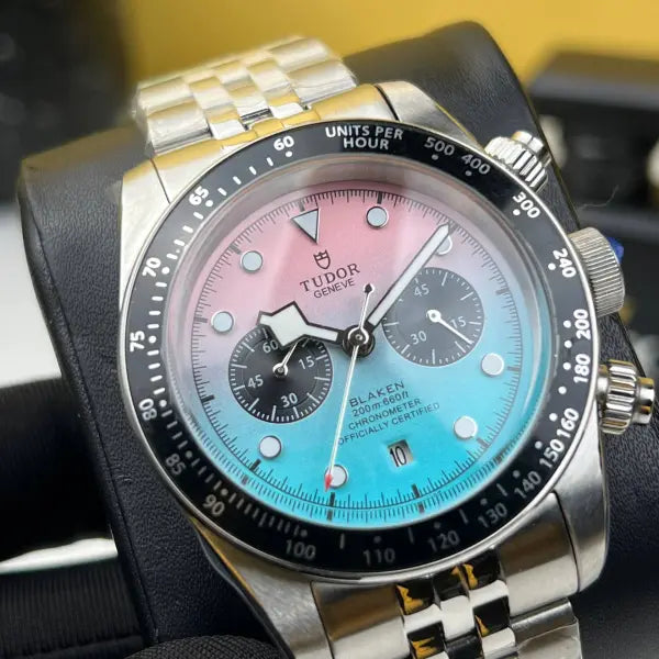 Tudor Black Bay Chrono men's chronograph watch, 41mm stainless steel case, pink and turquoise gradient dial, steel bracelet – dial close-up