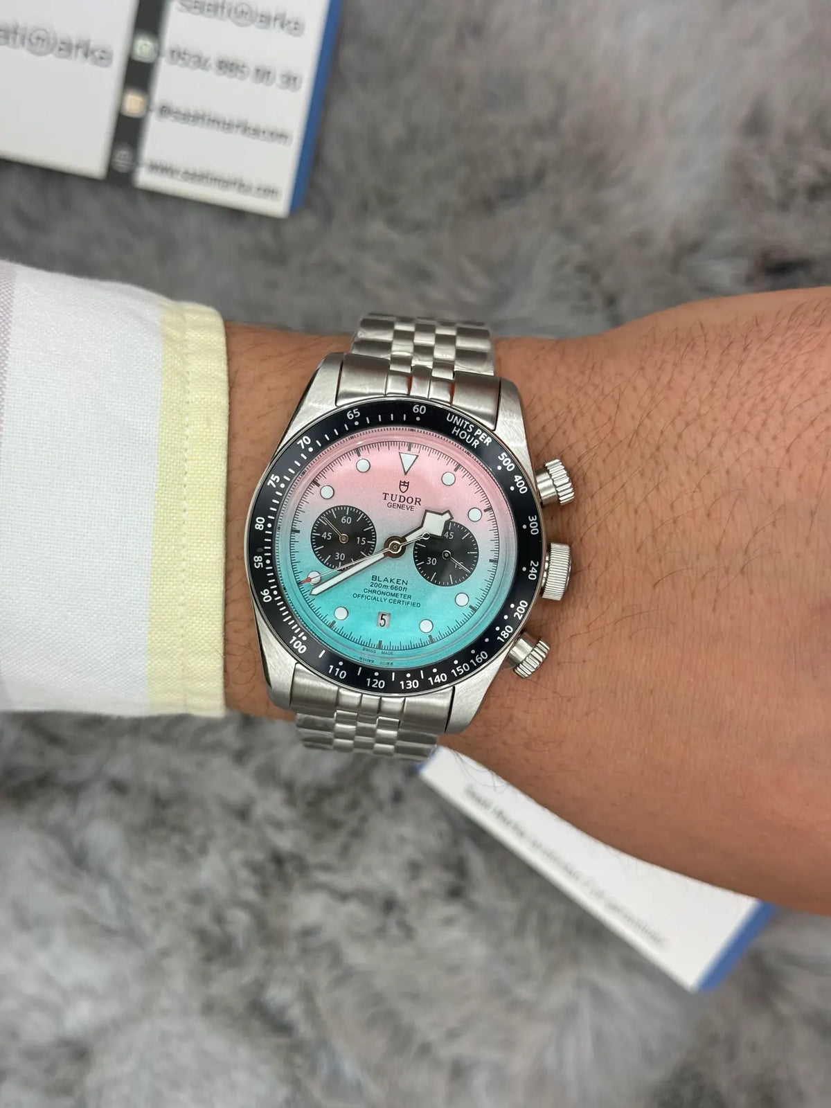 Tudor Black Bay Chrono men's chronograph watch, 41mm stainless steel case, pink and turquoise gradient dial, steel bracelet – on wrist view