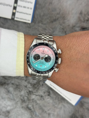 Tudor Black Bay Chrono men's chronograph watch, 41mm stainless steel case, pink and turquoise gradient dial, steel bracelet – on wrist view