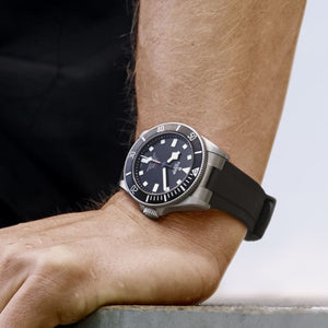 Tudor Pelagos men's automatic dive watch, 42mm titanium case, black dial, black ceramic bezel, black rubber strap – lifestyle wrist view