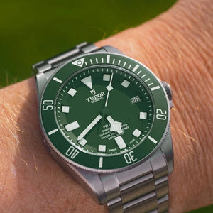 Tudor Pelagos men's automatic dive watch, 42mm titanium case, green dial, titanium bracelet – on wrist view