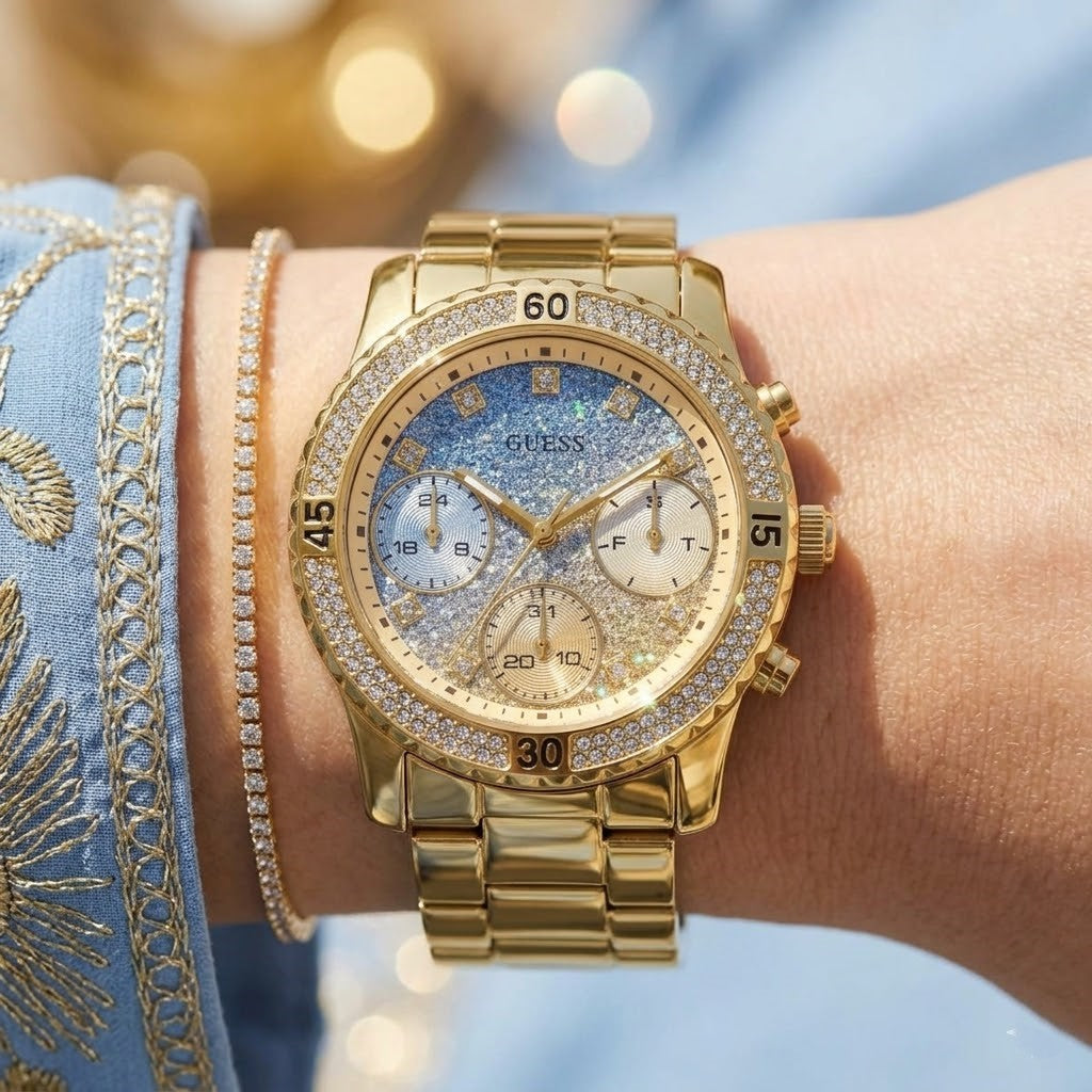 Close up shot of Guess W0774L2 on wrist showing glitter ombre dial and crystal details
