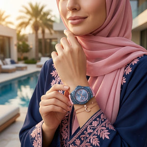 Lifestyle photo of Guess W0775L5 showing the watch on a woman's wrist with accessories