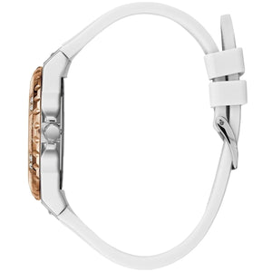 Close-up of a watch with a white strap and rose gold case on a white background
