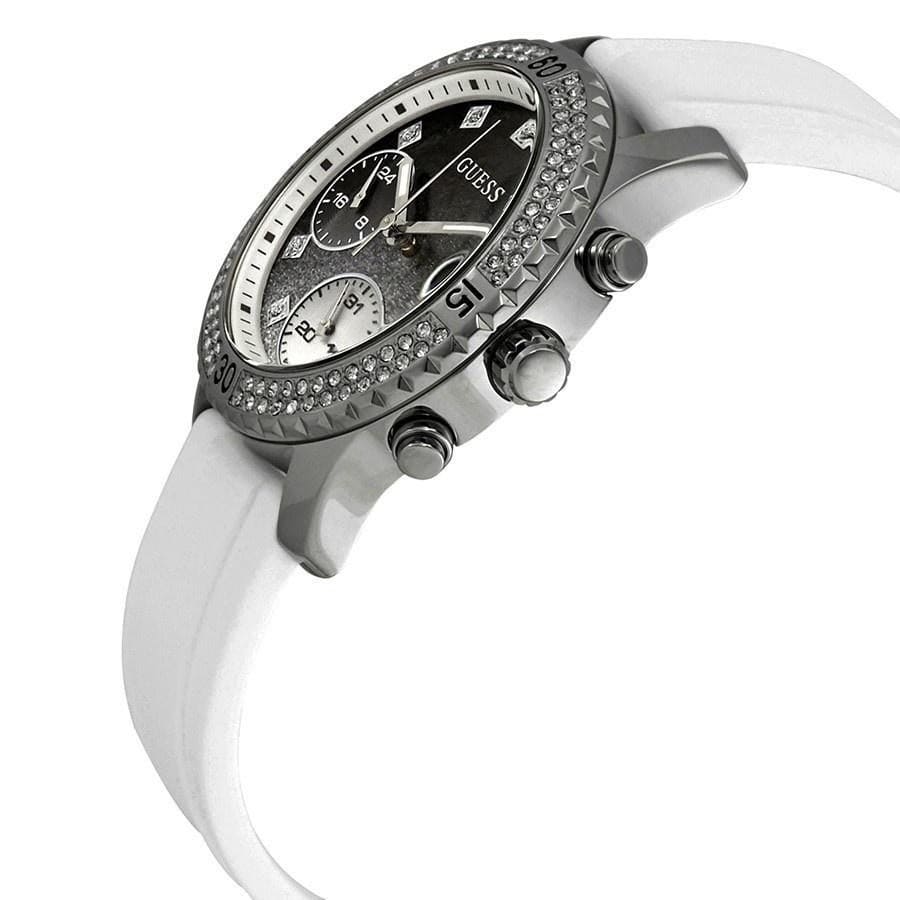 Right angled view of Guess Confetti W1098L1 women's multi-function watch highlighting polished silver finish and cushion case details