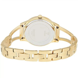 Caseback of Guess W1145L3 women's quartz battery watch showing technical specs 30m water resistance and stainless steel material