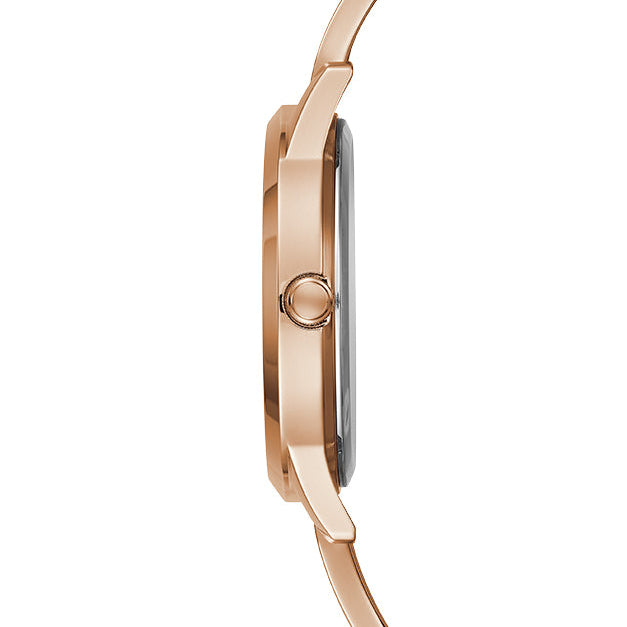 Side profile of Guess W1145L4 women's quartz battery watch showing 8mm thickness and polished rose gold finish