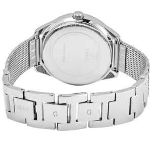 Caseback of Guess Claudia W1279L1 women's quartz battery watch showing technical specs 30m water resistance and stainless steel material
