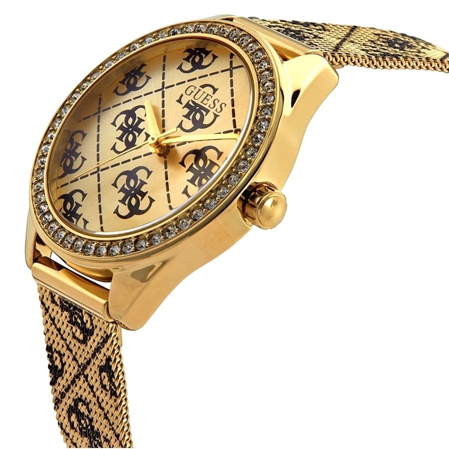 Left angled view of Guess Claudia W1279L2 women's quartz battery watch showing printed gold mesh strap and sleek case profile