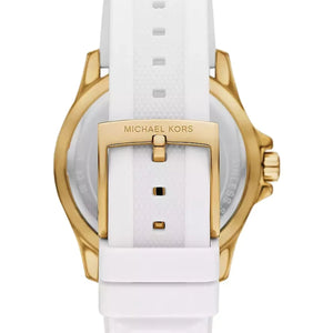 Michael Kors women's watch shown from the back, featuring a white textured silicone strap and a gold-tone case with a gold buckle.